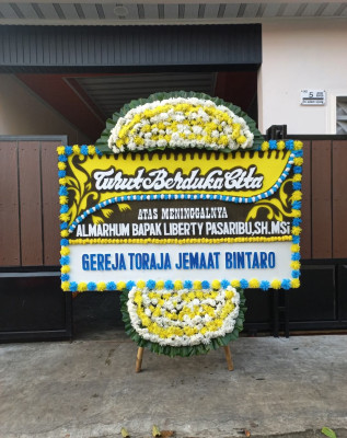 Papan Bunga Duka di Kelapian